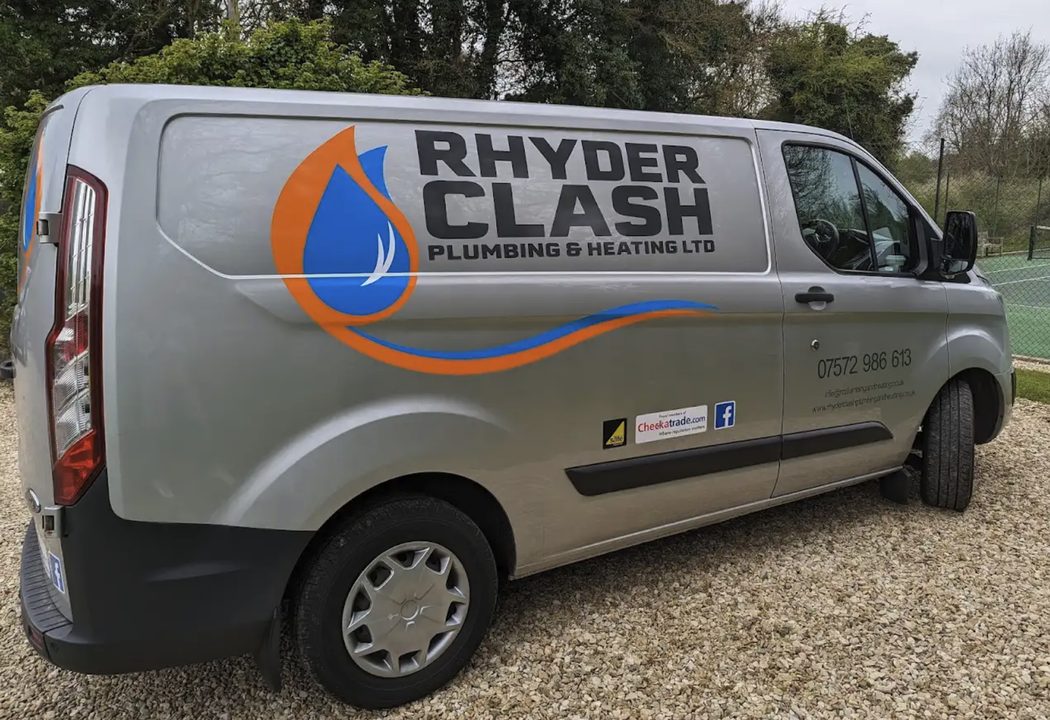 The Rhyder Clash Plumbing & Heating van, with the company logo and phone number